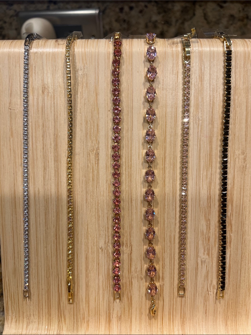 CZ Tennis Bracelets silver/white, gold with pink and black stones